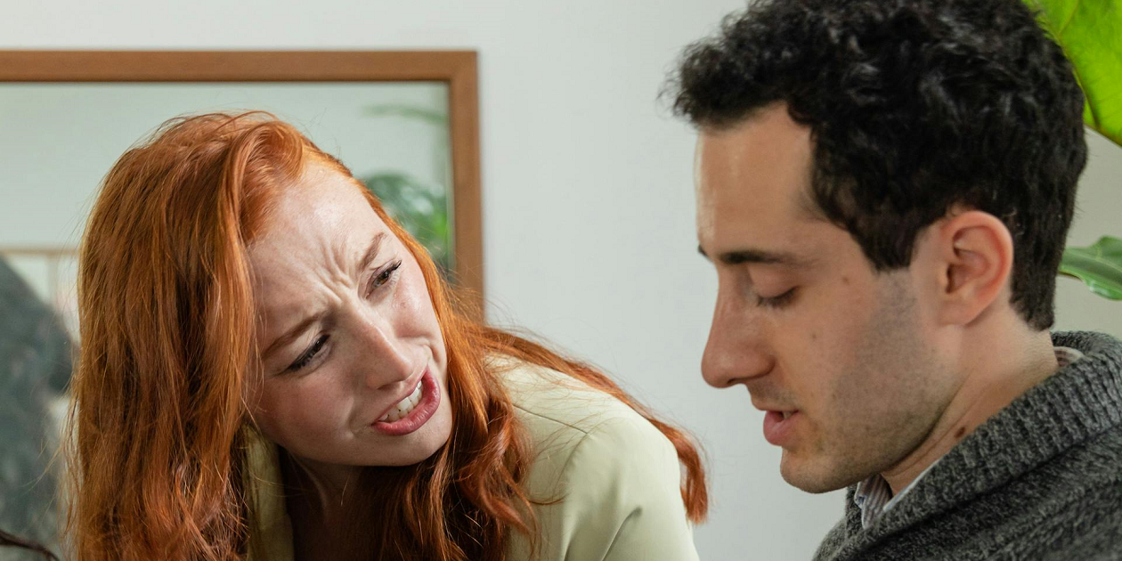 A woman being angry at a man